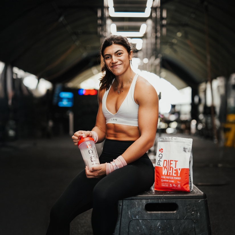 Girl holding protein shake